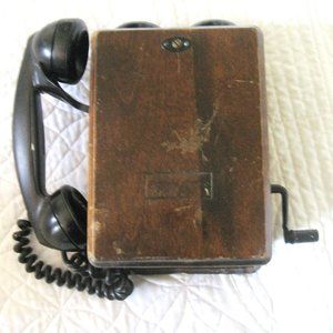 An awesome 1940's Northern Electric Wall Oak Crank phone.